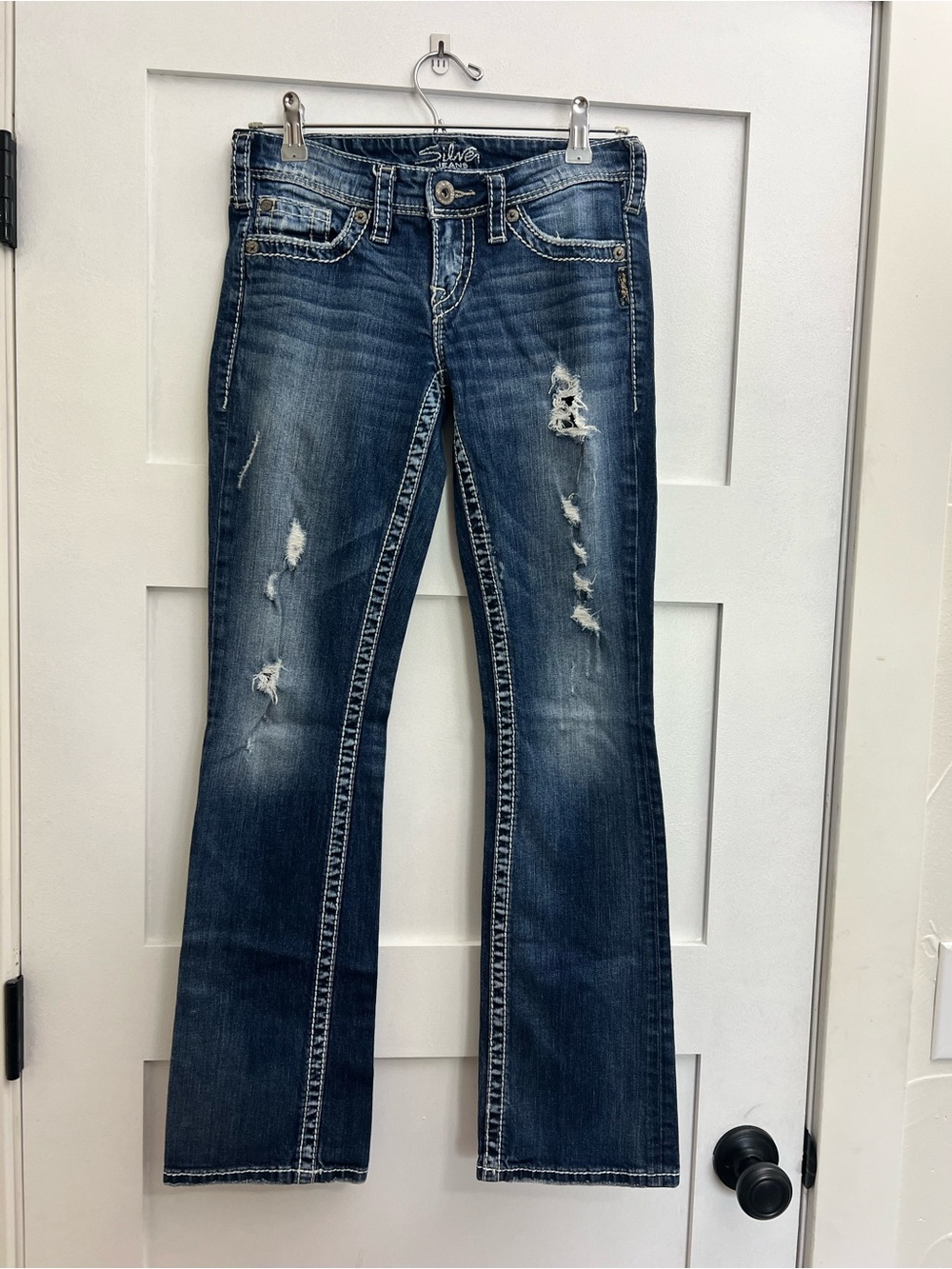Silver Jeans Women's Distressed Low Rise Boot Cut Jeans